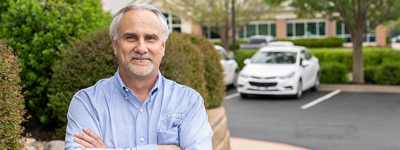 Car-Mart VP of Underwriting Rick Musial outside
