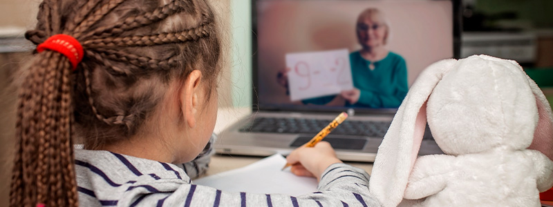 Girl learning on a laptop