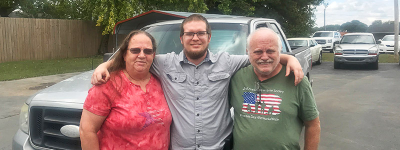 Keith with his wife and son