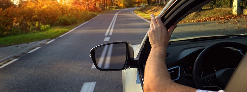 car driving down a road