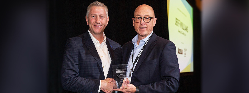 Jeff Williams being presented award by Steve Jordan, EVP KAR Global Dealer Sales