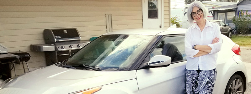 Shelly Jones standing by her car