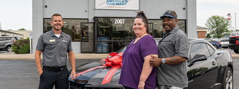 Robbie and Ricky McKoy with their most recent purchase. Also in photo is General Manager Curtis Valentine