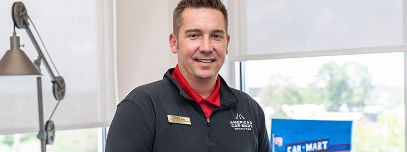 Mike Rains, Vice President of Collections in his office at Car-Mart's Corporate Office in Rogers, AR