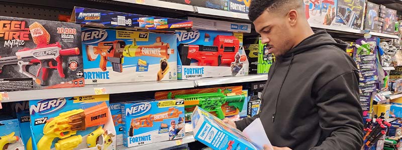 Jalen Catalon toy shopping for the Northwest Arkansas Children’s Shelter