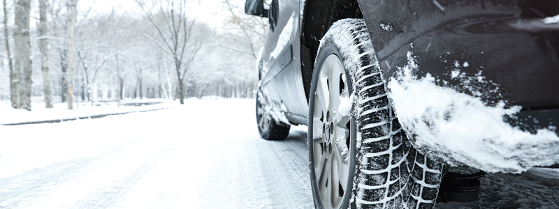 Car driving in snow.