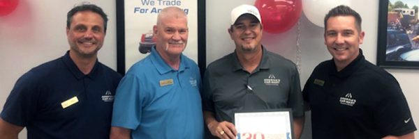 General Manager Aaron Davis celebrates 30 years of service with America's Car-Mart.