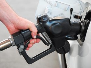 Person refueling their gas tank